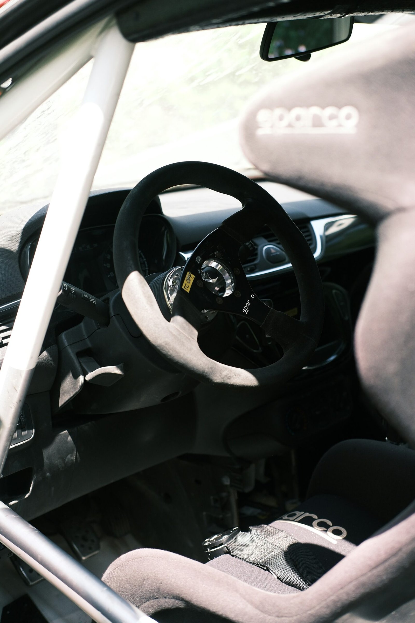 the interior of a car with a steering wheel